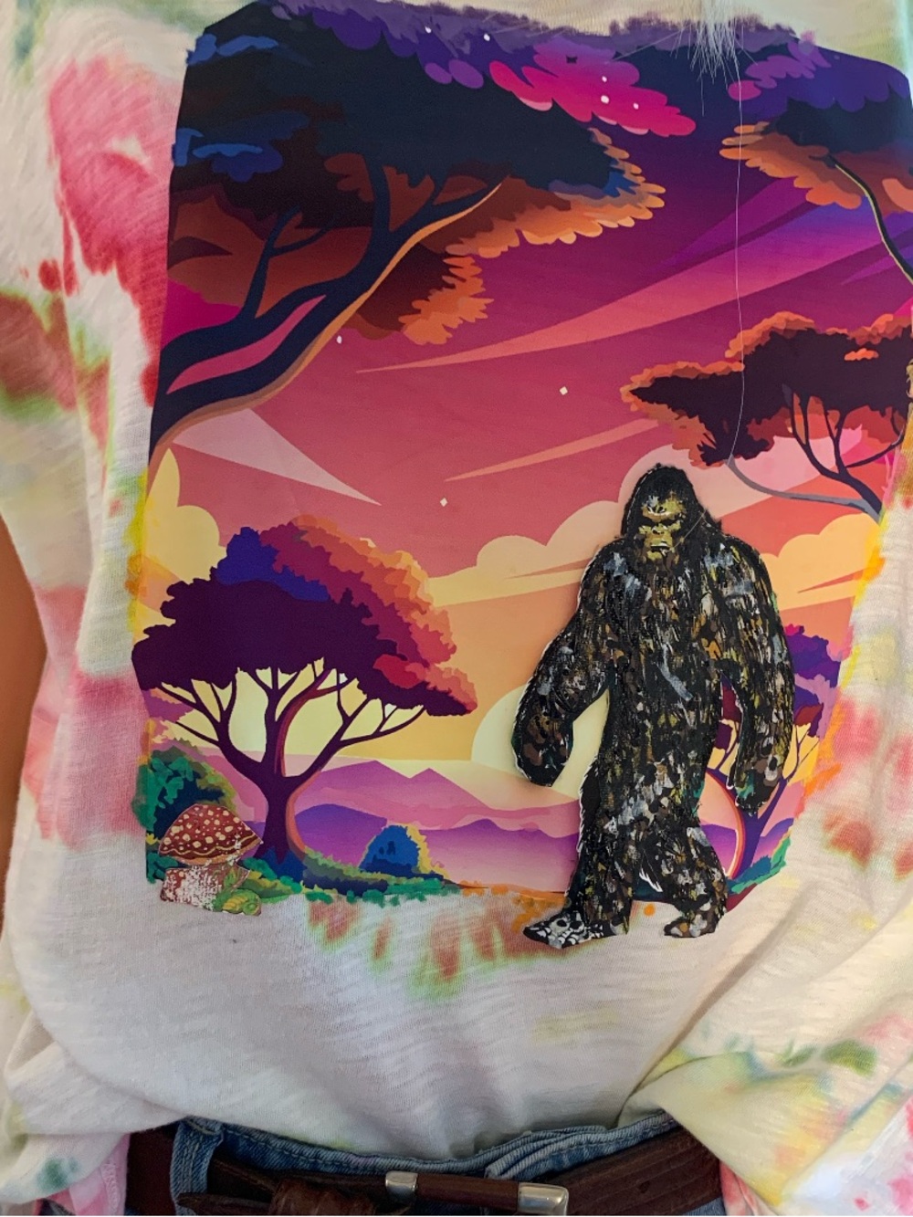 Tie-Dye Short Sleeve Tee with Colorful Sunset Graphic and Bigfoot Motif